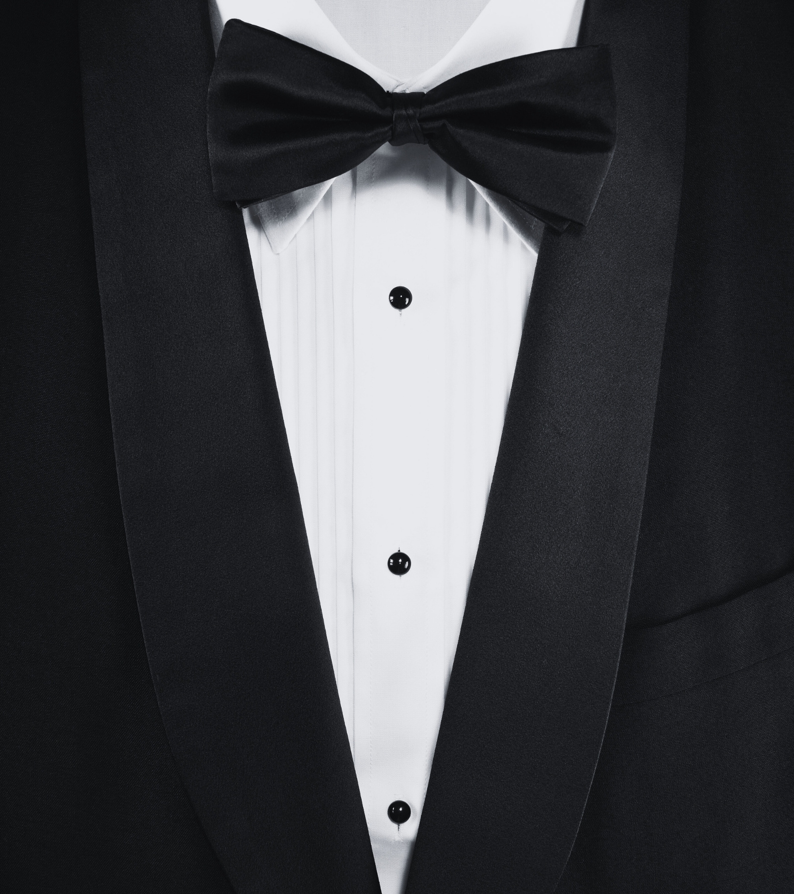 An image displaying a suit and bowtie look, symbolising a manly area on the screen