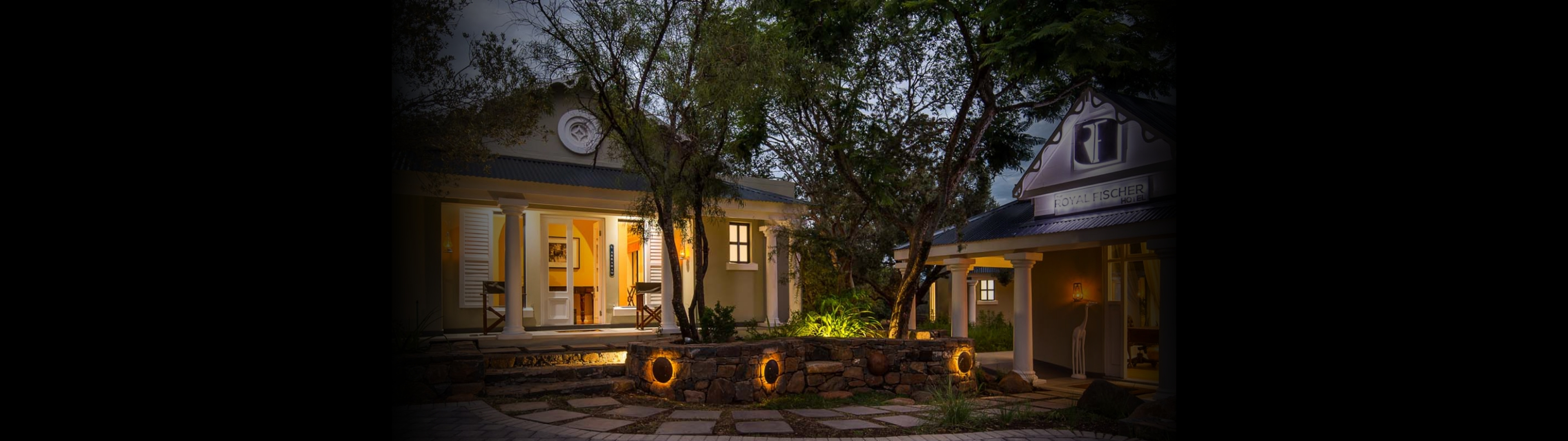 A background image with a photo of the venue The Royal Fischer Hotel